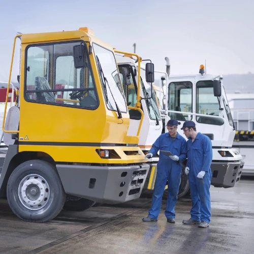 a row of parked commercial vehicles in a fleet
