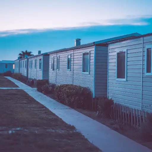 wooden mobile homes at night