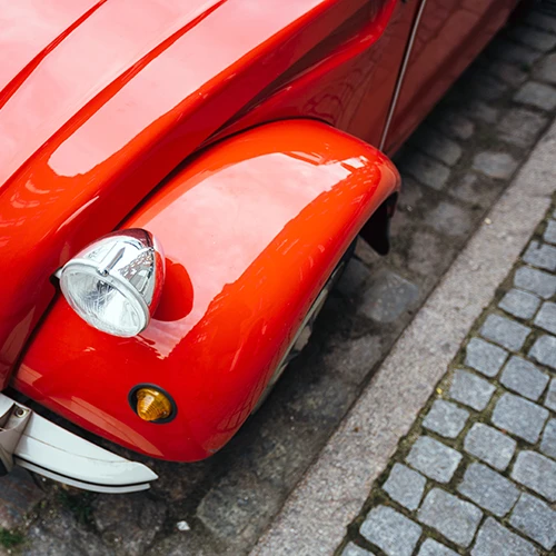 a red classic car