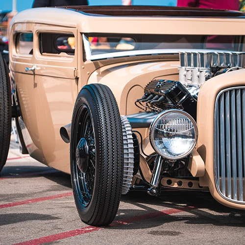a beige hot rod